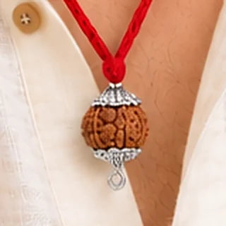 Close-up of the 7 Mukhi Rudraksha pendant as worn